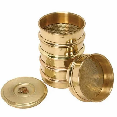 Brass-coloured test sieves with lid and receiving pan